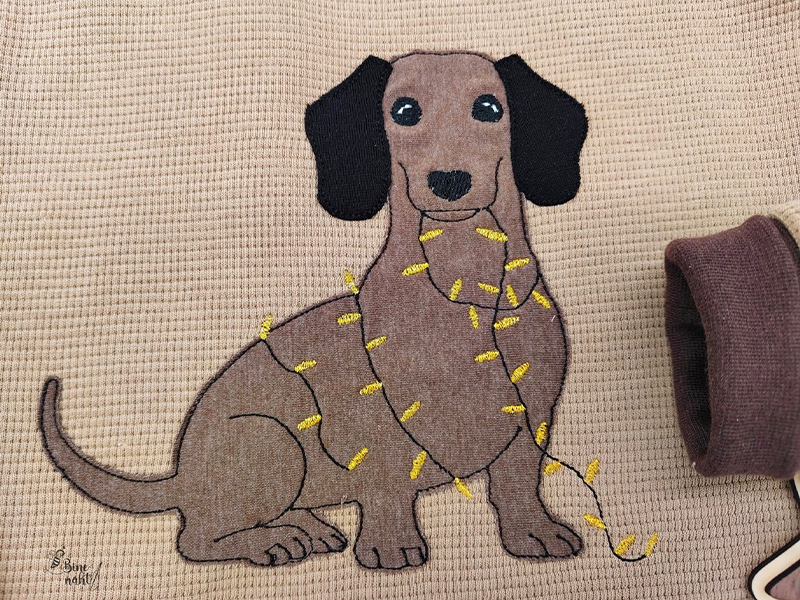 Preview: Dackel mit Lichterkette - doodle Stickdatei